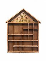 Front view of vintage wooden hanging wall shelf with multiple compartments and decorative text