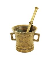 Brass mortar and pestle with handles and textured pestle shown clearly