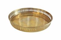 Round brass tray with pierced sides