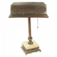 Metal desk lamp with cream marble base, ornate metal platform, rectangular metal shade, pull chain