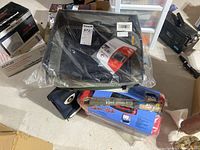 Photo showing the overall lot with bags and cooler combo visible.