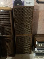 Four speakers including two stacked Sansui SP-5500X, one Pyramid PW848US-X, and one Synco Sound Deranged-8 with brown wood veneer and diamond patterned fabric grille.