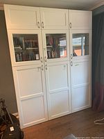 Front view of three assembled cabinet modules