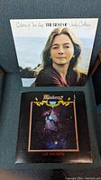 Two 12" vinyl record album covers side by side, Judy Collins greatest hits and Cat Stevens "Numbers" albums.