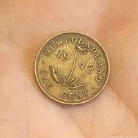 Obverse side showing the denomination, year '1942', sprig design, and 'NEWFOUNDLAND ONE CENT' text.