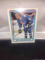 Photo of the front side of the Guy Lafleur hockey card in Quebec Nordiques uniform.