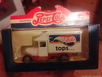 Front view of the Pepsi Cola die cast toy truck in its original packaging box showing branding and condition.