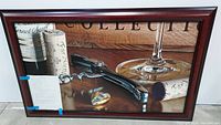Full artwork showing wine bottle, corkscrew, corks, wine glass and framed composition.
