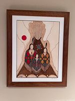 Full frontal view of the framed painting showing the complete artwork with three faceless figures and red sun in natural finish wooden frame.