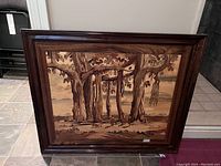 Full-frontal view of framed wood inlay landscape on floor