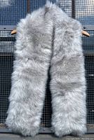Front view of the full grey faux fur scarf, showcasing its length, fullness, and soft texture.