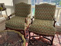 Front view of both chairs in room setting