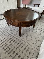 Round coffee table overview in living room setting