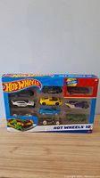 Front view of the Hot Wheels 10 Pack box showing all 10 cars clearly in the original sealed packaging.