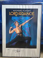 Full view of framed Michael Flatley 'Lord of the Dance' poster with the dancer in a striking pose and clear visible text and signature.