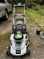 Front view of the EGO 21" cordless mower showing deck, handles and control panel.