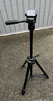 Velbond DF60 camera stand tripod fully extended showing pan handle and adjustable head with bubble leveler on leg hub