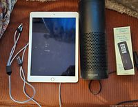 Amazon Echo, iPad Air 2 and Gentle Reminder Timer laid out showing front of tablet, cylinder speaker and timer box