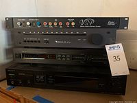 Front view of all four stacked audio components