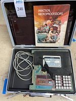 Overall view: case open showing lab module, foam, manual