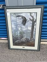 Full view of framed eagle print showing entire frame, matting, and plaque