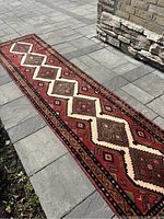 Full-length overview shot angled to show runner shape and overall pattern