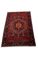 Full view of rug lying flat showing overall pattern and colours