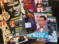 Lot of several vintage magazines visible including Life and Spin, with the Spin magazine on top featuring Morrissey on the cover.