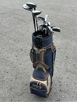 Front view of the golf bag filled with clubs showing club heads and bag branding