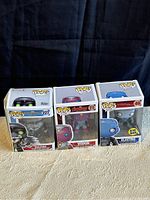 Lot of 3 Marvel Funko Pop figures in original boxes with clear display windows showing Vulture, Vision, and Electro characters.