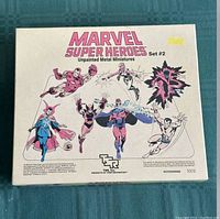 Front of box showing Marvel Super Heroes Set #2, unpainted metal miniatures with artwork of various Marvel characters.