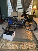 Full left-side view of bike with accessories