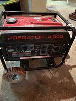 Front and right side view showing frame, tank, control panel and wheel