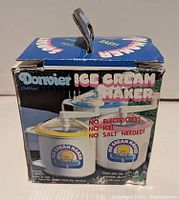 Original product box showing branding and claims no electricity, no ice, no salt needed