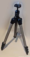 Full view of Manfrotto Model 390 tripod with aluminum legs and black ball head