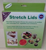 Box of 6 pack reusable transparent silicone stretch lids with product information and usage photos shown on the front of packaging.