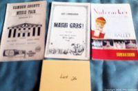 Photo showing three vintage playbills/flyers including Greene County Music Park, Mardi Gras, and Nutcracker Ballet.