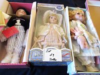 Boxed dolls and loose Seymour Mann baseball doll