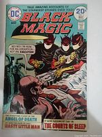 Front cover of 1974 Black Magic comic book, issue #3, 20 cent price visible, showing masked figures and restrained man in illustrated scene.