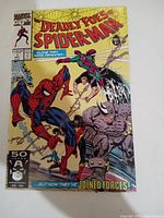 Front cover image showing the full comic cover with Spider-Man, Rhino, and Green Goblin characters and the title Deadly Foes Spider-Man.