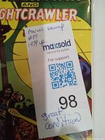 Close-up photo of the comic book with label stating 'Marvel teamup #89 1979 yr, great condition'