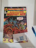Front cover of Morlock 2001 Midnight Men comic book issue #3 showing characters in action and monster foreground