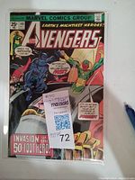 Front cover of The Avengers comic book issue #140 from 1975 showing colorful illustration with several Avengers characters including Vision and a 50-foot hero.
