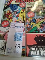 Front cover featuring multiple Avengers characters, showing front of the comic with a label noting issue #197 and good condition.