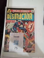 Front cover of The Destructor comic book #4 with a visible price of 25 cents and the character firing energy blasts.