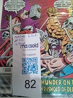 Close-up photo of the comic cover title area with a label showing lot number and more published info, confirming it is Marvel 2 in 1 #22 from 1978.