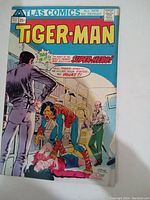 Front cover of Tiger-Man #1 comic book showing the main title, characters, and dialog balloons.