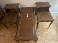 Photo showing full set of coffee table and two end tables from above, details inlay and wood finish.