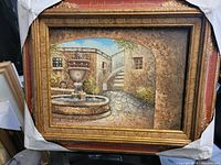 Oil on canvas painting showing a courtyard with a central stone fountain and curved stone steps, with textured stone walls and flowers