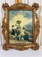 Full view of the ornate gold frame and the print showing figures harvesting grapes near a mountain scene.